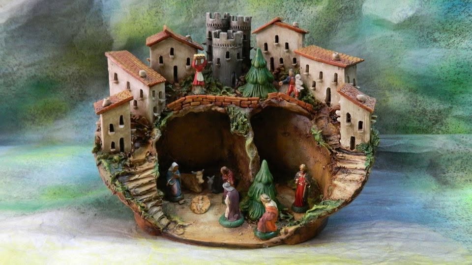 Presepe in ceramica con borgo e castello